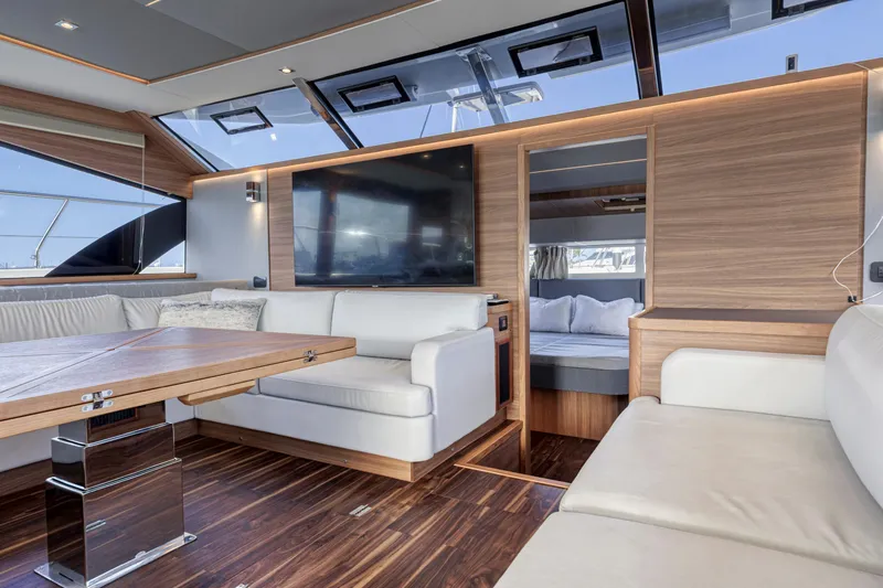 Slide: The Image of Luxurious interior of 2023 Aquila 54 Yacht with modern kitchen and spacious seating area. - 37