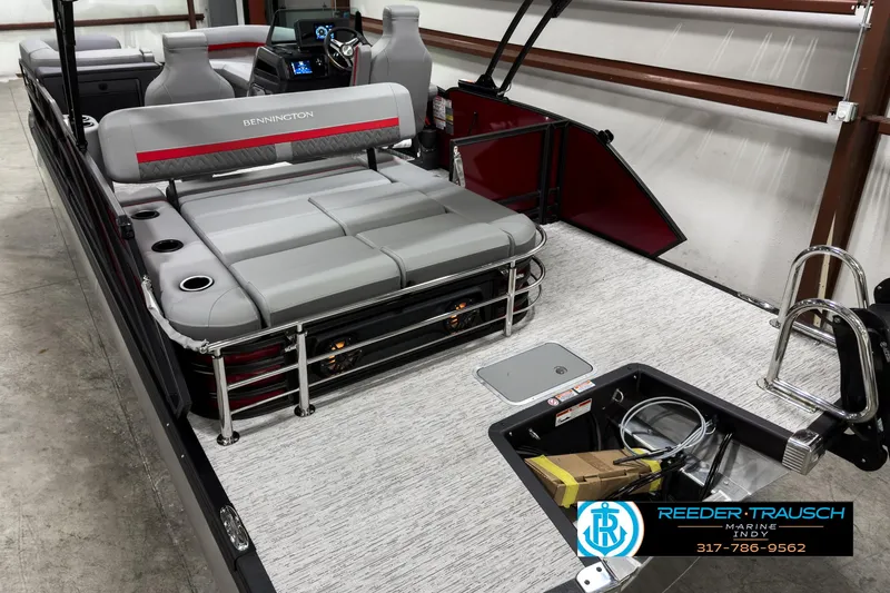 Slide: The Image of 2025 Bennington 24 MSB pontoon boat interior with gray seating and modern design. - 12