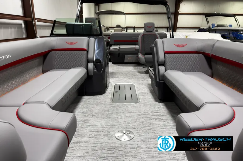 Slide: The Image of 2025 Bennington 24 MSB pontoon boat interior with luxurious seating and modern design. - 13