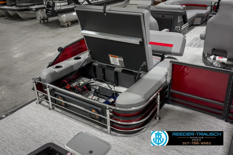 Slide: The Image of 2025 Bennington 24 MSB pontoon boat interior with open storage compartment. - 24