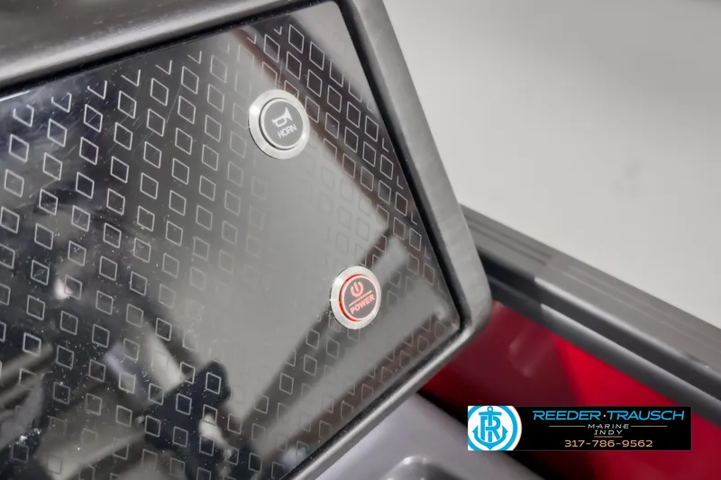 Slide: The Image of Control panel of 2025 Bennington 24 MSB boat with power and horn buttons. - 35