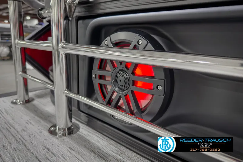 Slide: The Image of 2025 Bennington 24 MSB boat speaker with red LED lighting and metal railing. - 39