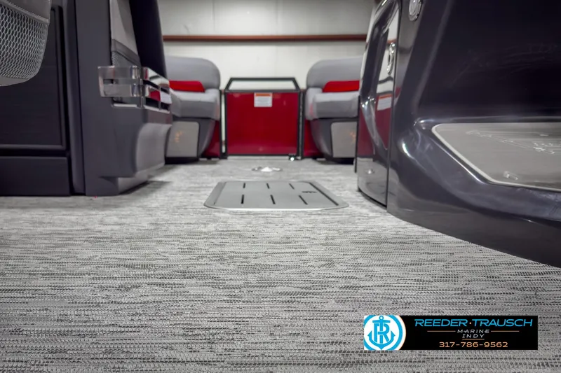 Slide: The Image of 2025 Bennington 24 MSB interior with modern seating and carpeted flooring. - 41