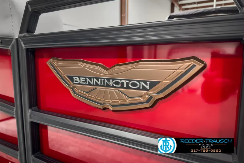 Slide: The Image of 2025 Bennington 24 MSB boat emblem on red background, Reeder-Trausch Marine logo visible. - 42