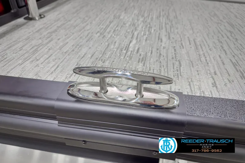 Slide: The Image of Chrome cleat on 2025 Bennington 24 MSB boat deck, Reeder-Trausch Marine logo visible. - 46