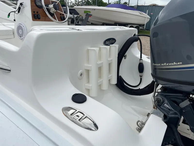 Slide: The Image of 2015 AB Inflatables Nautilus 12 DLX boat with outboard motor and steering console. - 3