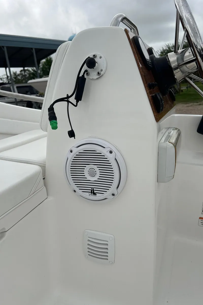 Slide: The Image of 2015 AB Inflatables Nautilus 12 DLX boat console with speaker and steering wheel. - 7