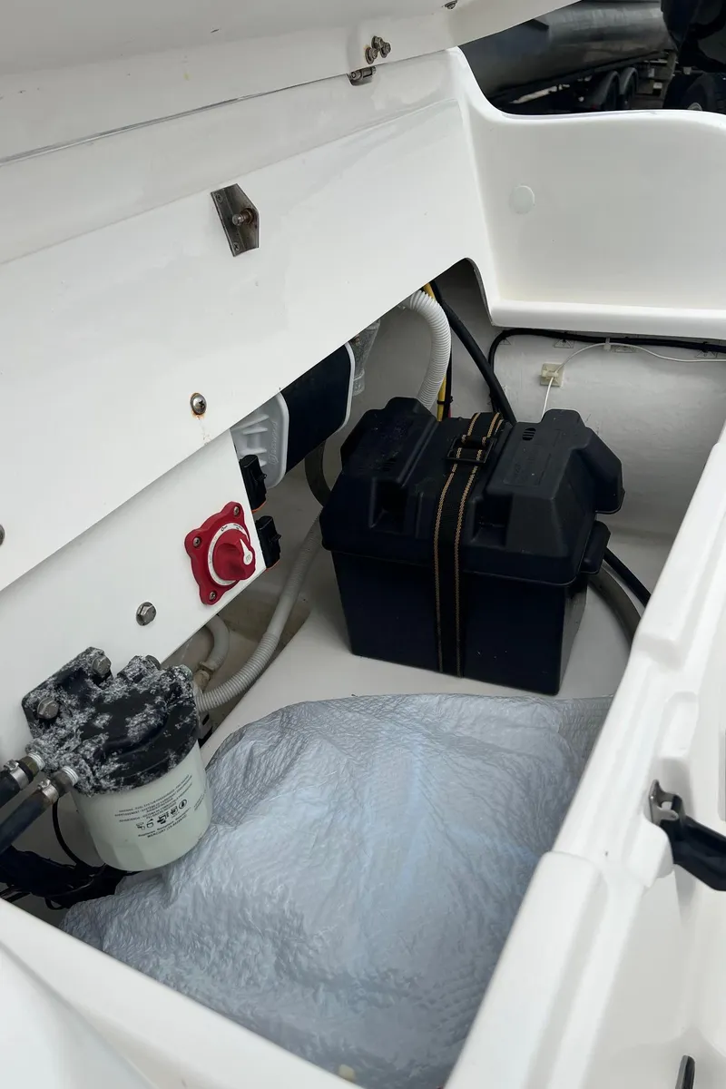 Slide: The Image of 2015 AB Inflatables Nautilus 12 DLX boat interior showing battery compartment and wiring. - 8