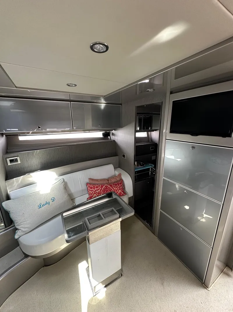 Slide: The Image of Luxurious interior of a 2015 Riva Rivarama Super yacht with modern furnishings. - 25