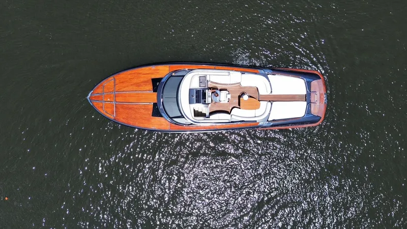 Slide: The Image of Aerial view of a 2015 Riva Rivarama Super yacht on water. - 5