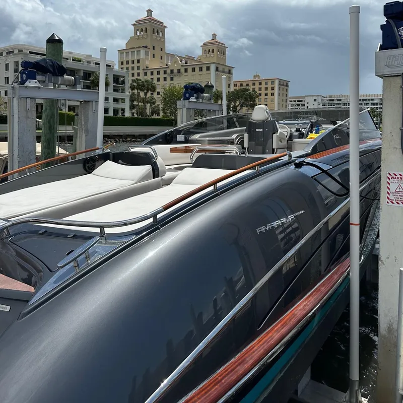 Slide: The Image of Luxury 2015 Riva Rivarama Super yacht docked at marina with elegant design. - 13