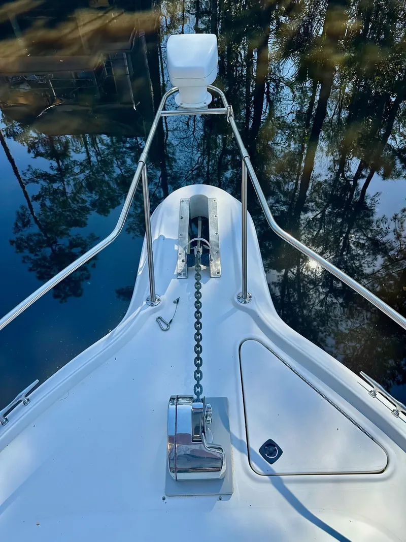 Slide: The Image of Bow of a 1995 Sea Ray Sundancer with anchor chain and water reflection. - 5