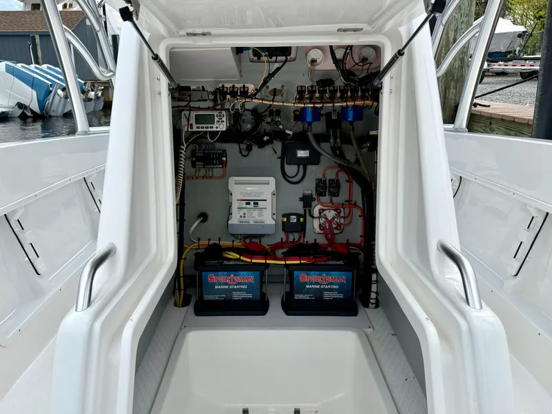 Slide: The Image of 2015 Concept 27' CC boat electrical system with batteries and wiring. - 13