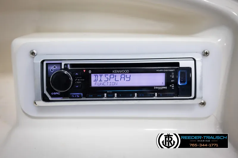 Slide: The Image of Kenwood stereo system in 2007 Monterey 234 FS boat dashboard. - 29