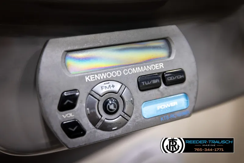 Slide: The Image of Kenwood Commander stereo system in a 2007 Monterey 234 FS boat. - 32