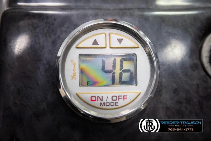 Slide: The Image of Digital gauge displaying "46" on a 2007 Monterey 234 FS boat dashboard. - 38