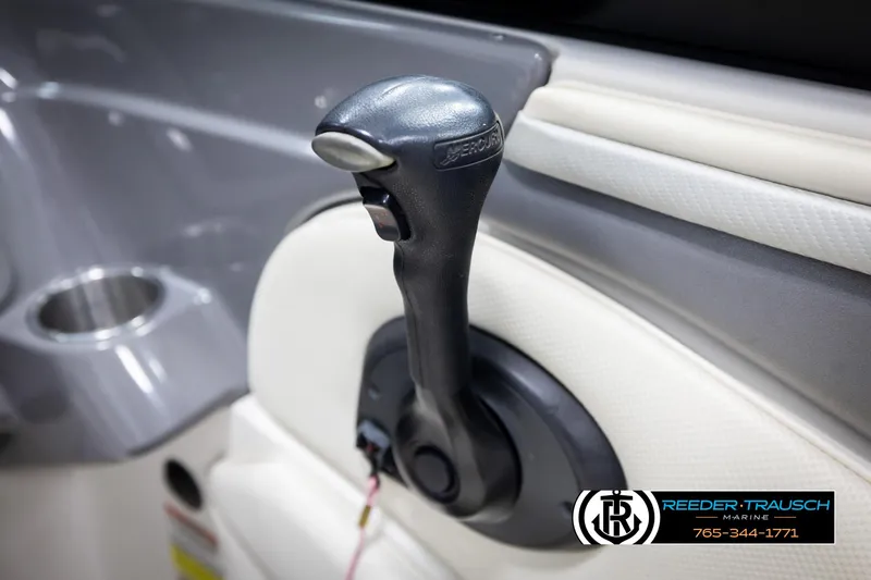 Slide: The Image of Boat throttle control in a 2007 Monterey 234 FS, featuring sleek design and functionality. - 39