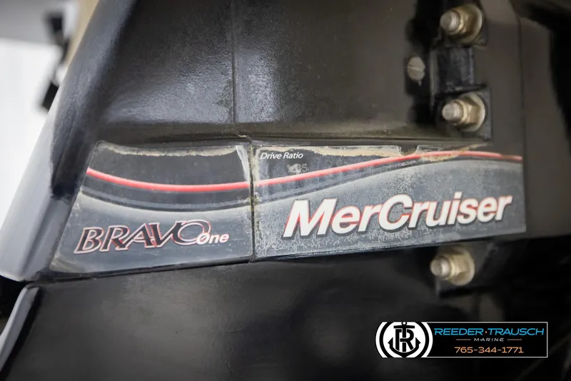 Slide: The Image of MerCruiser Bravo One drive on 2007 Monterey 234 FS boat, featuring Reeder-Trausch Marine branding. - 49