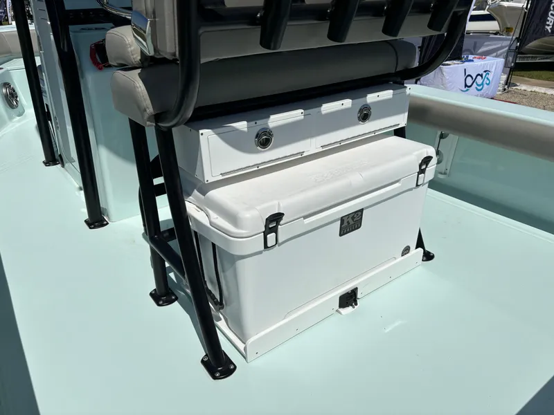 Slide: The Image of 2024 Clark Sound 24 boat interior with seating and storage cooler. - 23