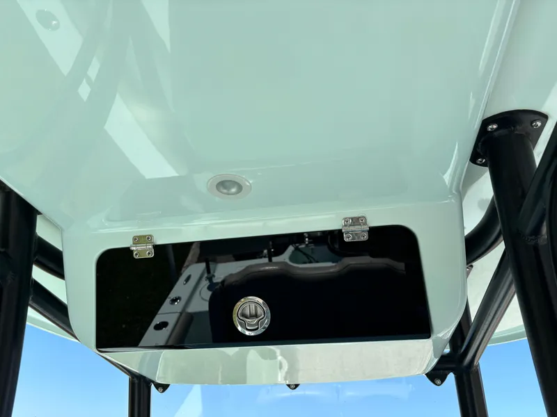 Slide: The Image of 2024 Clark Sound 24 boat console with storage compartment and sleek design. - 30