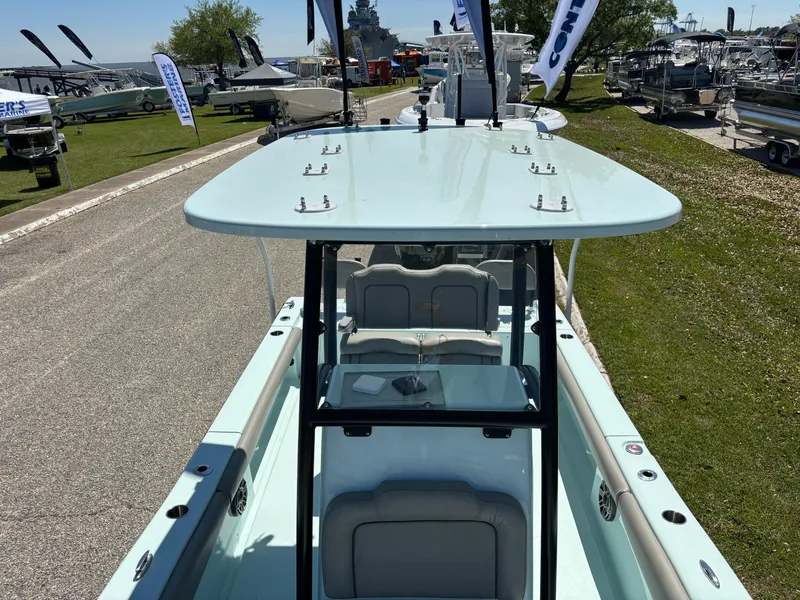 Slide: The Image of 2024 Clark Sound 24 boat displayed at an outdoor boat show. - 43