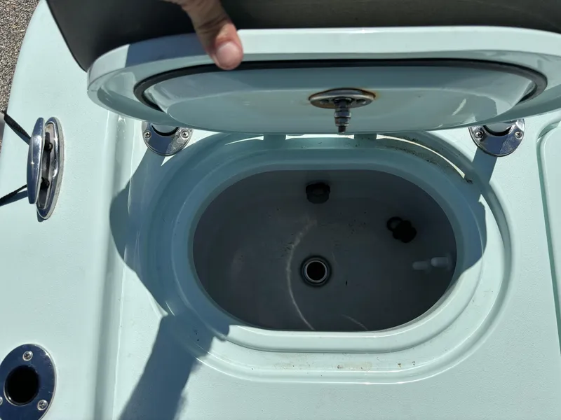 Slide: The Image of Open storage compartment on a 2024 Clark Sound 24 boat. - 7