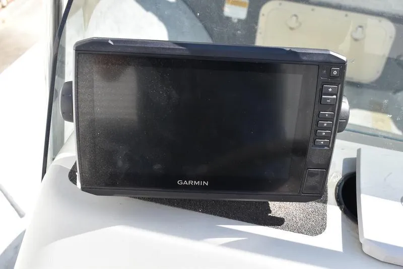 Slide: The Image of Garmin GPS device on a Kenner 16v boat dashboard, 1996 model. - 20