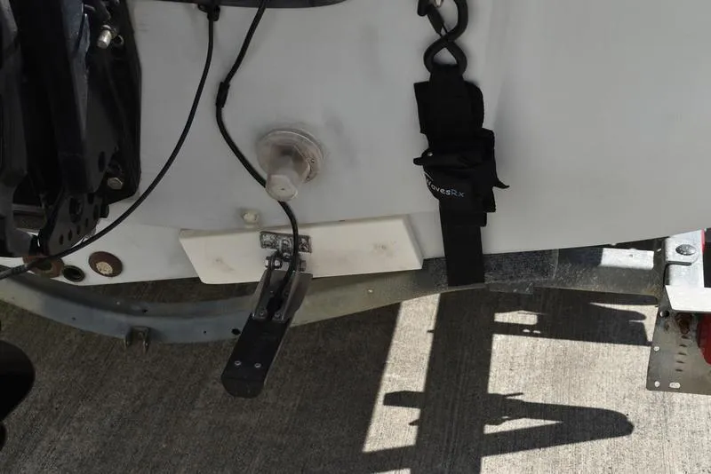 Slide: The Image of 1996 Kenner 16v boat transom with mounted equipment and wiring. - 5