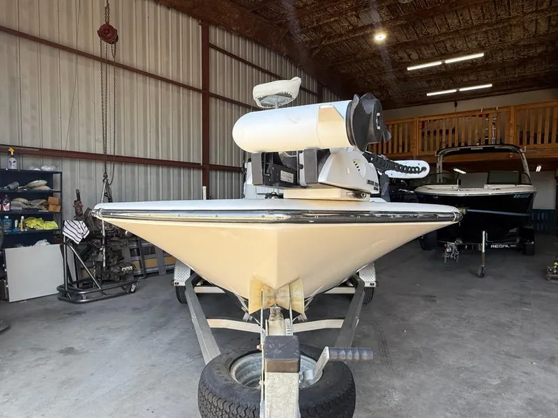 Slide: The Image of 2015 Sea Born FX22 boat on trailer in a garage. - 3