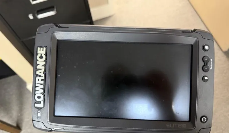 Slide: The Image of Lowrance Elite fish finder on a 2015 Sea Born FX22 boat. - 7