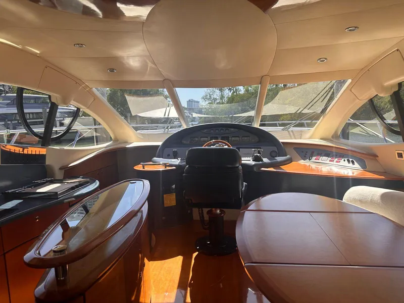 Slide: The Image of Luxurious interior of a 2007 Azimut 55E yacht with modern helm and seating. - 4