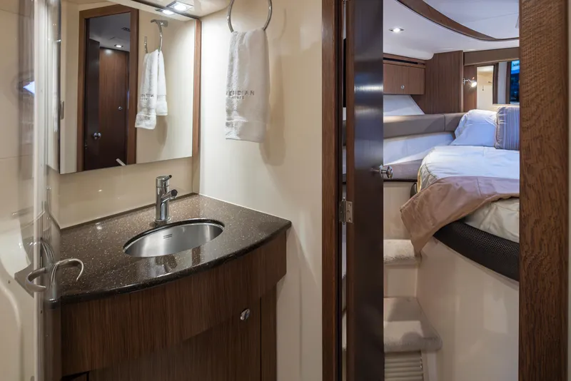 Slide: The Image of Luxurious bathroom and bedroom interior of 2015 Meridian 441 Sedan yacht. - 20