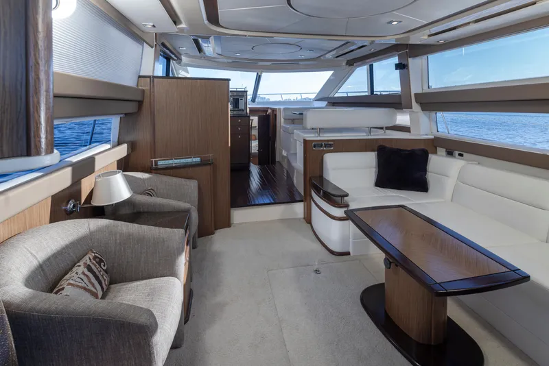 Slide: The Image of Luxurious interior of a 2015 Meridian 441 Sedan yacht with elegant seating and ocean view. - 4