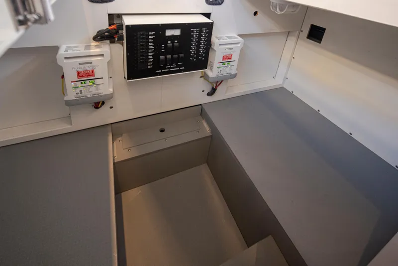 Slide: The Image of Electrical panel and battery setup in 2015 Meridian 441 Sedan yacht interior. - 40