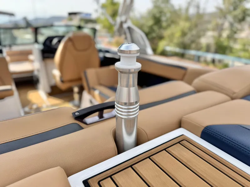 Slide: The Image of 2022 MasterCraft XStar interior with luxury seating and sleek design elements. - 12