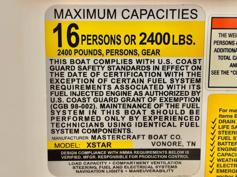 Slide: The Image of 2022 MasterCraft XStar capacity label: 16 persons or 2400 lbs, U.S. Coast Guard compliant. - 36