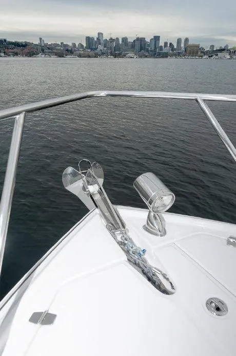 Slide: The Image of 2018 Regal 35 Sport Coupe bow with city skyline in background. - 22