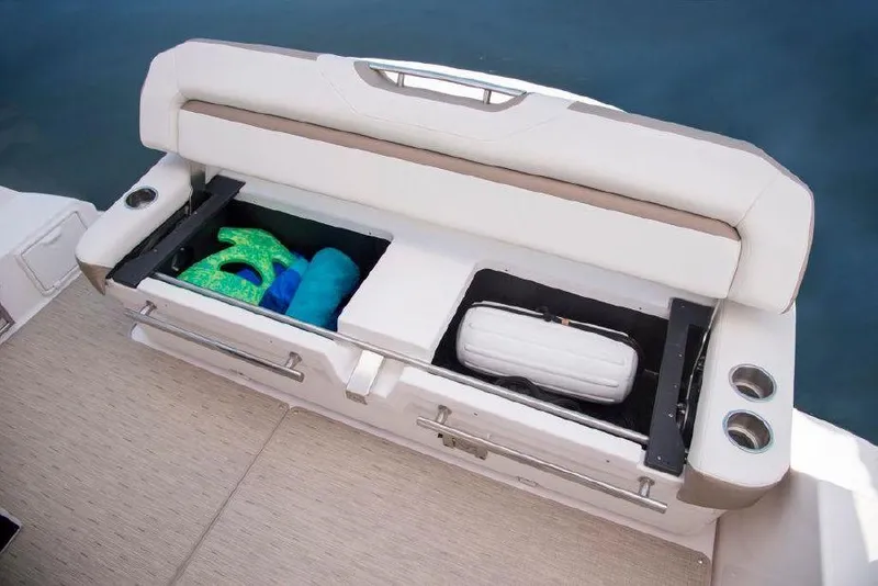 Slide: The Image of 2018 Regal 35 Sport Coupe storage compartment with life jackets and fender. - 40