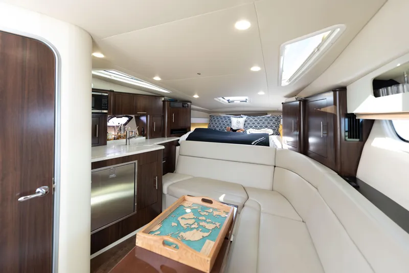 Slide: The Image of Luxurious interior of 2018 Regal 35 Sport Coupe with modern amenities and elegant design. - 42