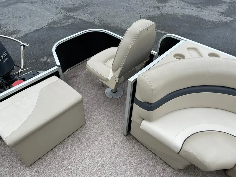 Slide: The Image of Interior of 2017 Misty Harbor 245 Adventure CC boat with beige seating and storage. - 15