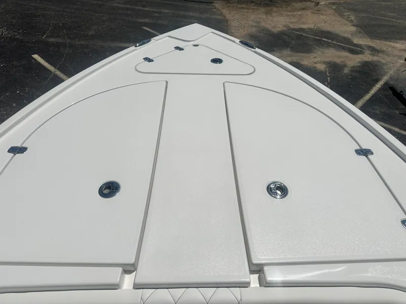 Slide: The Image of Bow of 2025 Blazer Bay 2440 boat, featuring sleek design and storage compartments. - 11