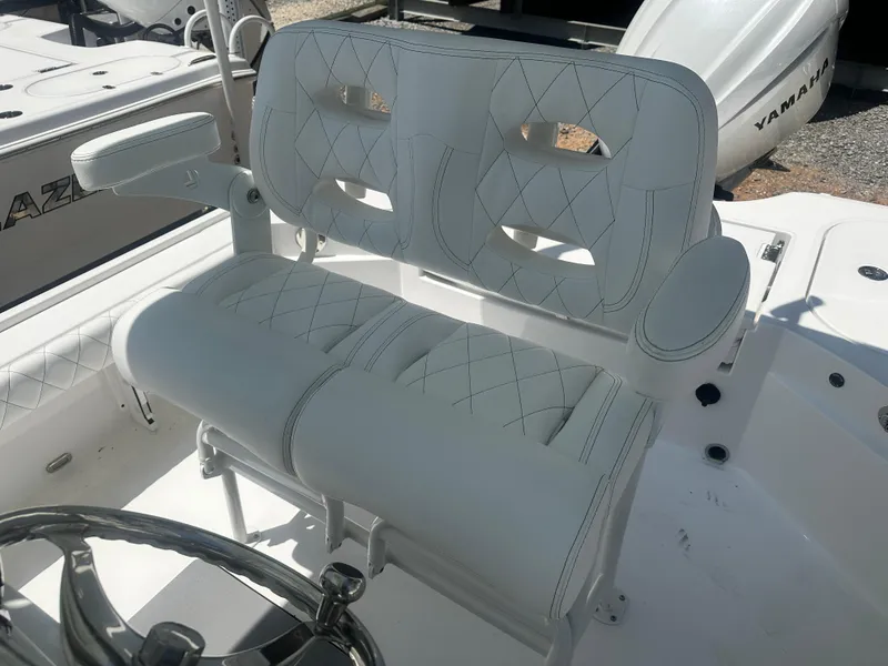 Slide: The Image of Luxurious seating on 2025 Blazer Bay 2440 boat, featuring white quilted upholstery. - 14