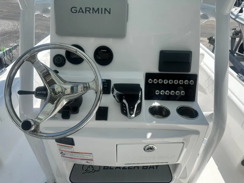 Slide: The Image of Steering console of 2025 Blazer Bay 2440 boat with Garmin navigation system. - 17