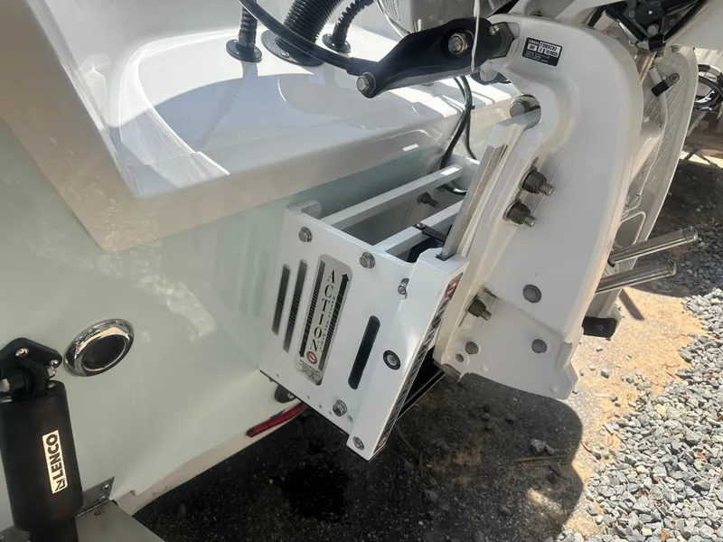 Slide: The Image of 2025 Blazer Bay 2440 boat engine mount with hydraulic components and Action Series jack plate. - 19