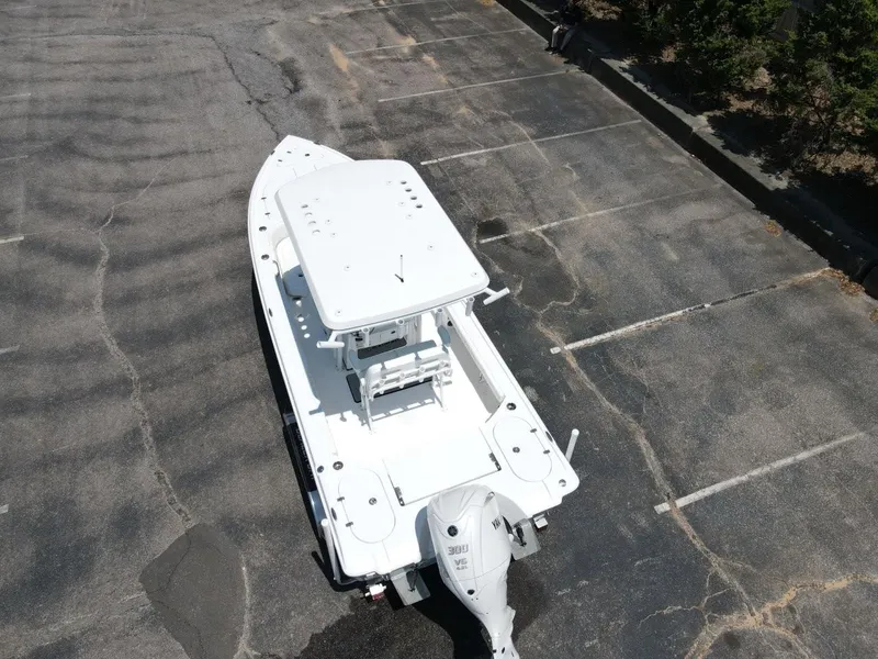 Slide: The Image of Aerial view of 2025 Blazer Bay 2440 boat in a parking lot. - 5