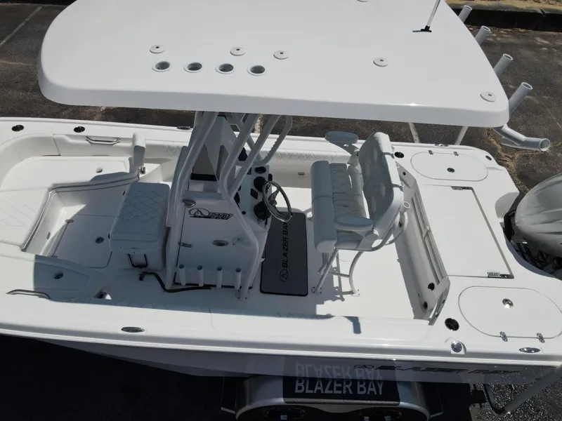 Slide: The Image of 2025 Blazer Bay 2440 boat with T-top and seating, viewed from above. - 6