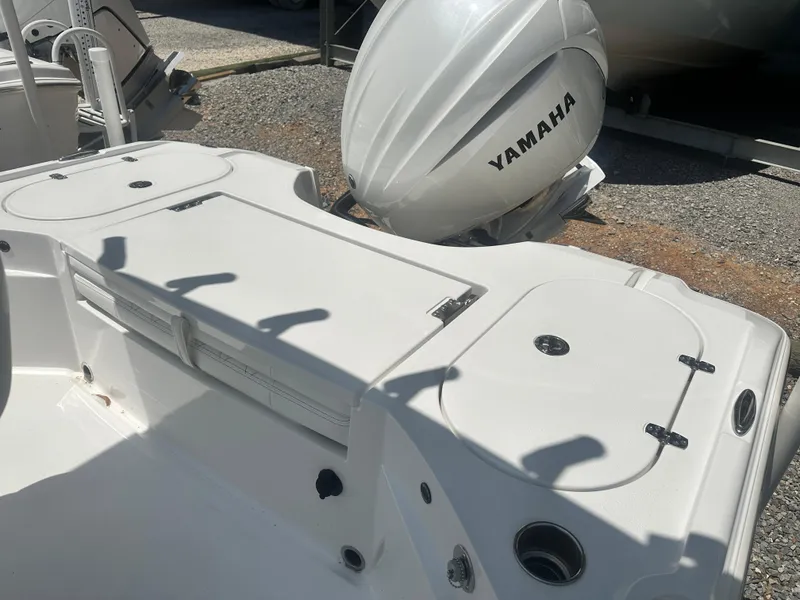 Slide: The Image of 2025 Blazer Bay 2440 boat with Yamaha outboard motor, featuring spacious deck layout. - 8