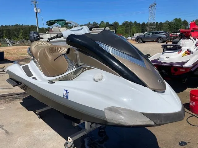 Slide: The Image of 2006 Yamaha WaveRunner FX Cruiser HO jet ski in a parking lot. - 1