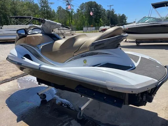 Slide: The Image of 2006 Yamaha WaveRunner FX Cruiser HO jet ski on display outdoors. - 2