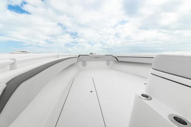 Slide: The Image of 2022 SeaHunter 41 CTS boat deck under a cloudy sky. - 5